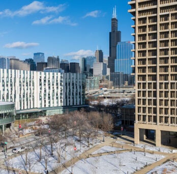 View of University Hall and the ARC with the Chicago skyline in the background. 